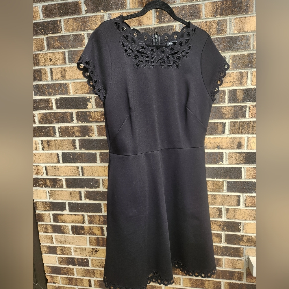 Size 14, white house black market black dress, with cut out details